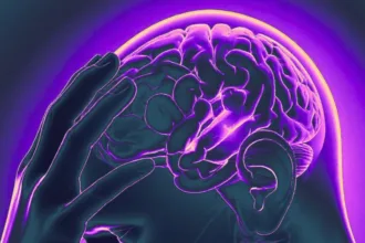 IllustrationOfHandOnBrainInPurpleAndBlue 1