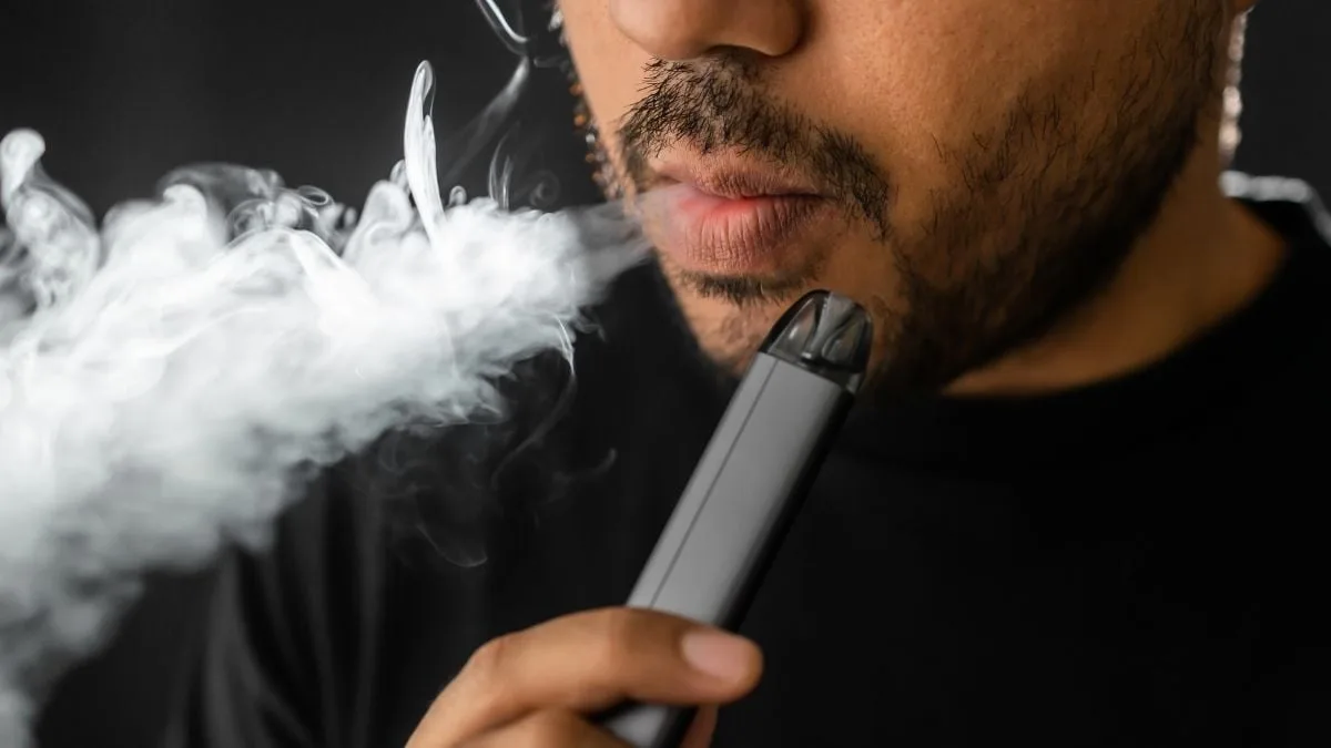 man vaping