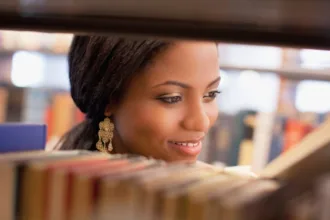 student in library