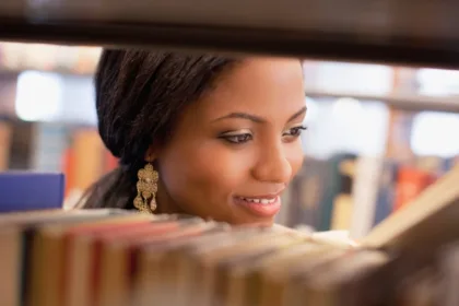 student in library